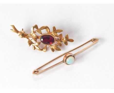 GARNET BROOCH ETC. A 9ct. rose gold garnet set brooch, width 4.3cm. Also, a bar brooch set a cabochon opal, unstamped.  Pleas