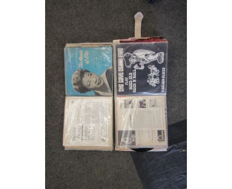 Two vintage record folders containing a collection of 1960's 7" EP's in picture sleeves 