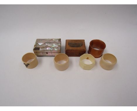 Small boxes, a Mauchline ware box and serviette ring etc 