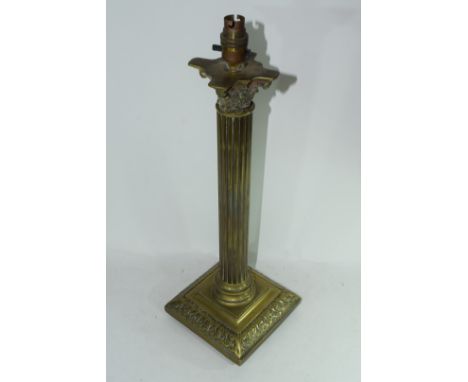 Brass table lamp, the Corinthian column stem over a square loaded base, 52cm high max