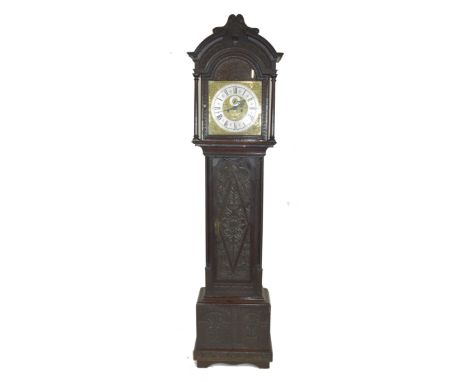 Ornately carved longcase clock, with gilt dial mounted with Roman chapter ring, subsidiary minutes and date, named for Richar