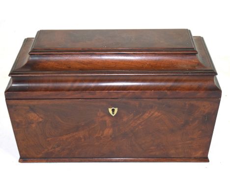 Georgian mahogany sarcophagus formed tea caddy, the hinged lid opening to an interior with two further lidded compartments an