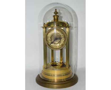 Late 19th/early 20th century French mantel clock with circular face with Arabic numerals to a twin train movement striking on