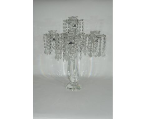 Cut glass candelabra with four sconces and four drops from each sconce, with a further central sconce above, 48cm high