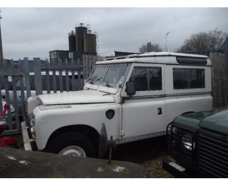 A 1984 Land Rover Series III station wagon, registration number A905 MAV, white. This Series III Land Rover has been well mai