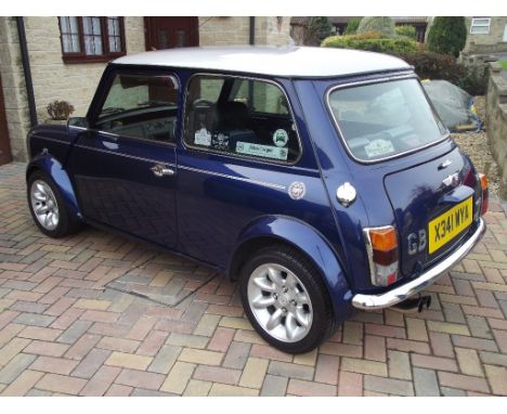 A 2000 Rover Mini Cooper John Cooper S Works, registration number X341 WYA, John Cooper S189, Tahiti blue. This beautifully m