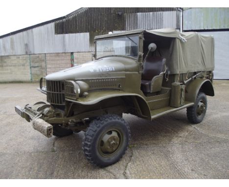 A 1941 left hand drive Dodge WC4 half ton pick-up truck with winch, registration number 767 YUF, Olive drab. Introduced in 19
