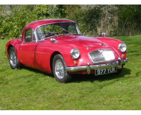A 1957 MG A coupé Mk I, registration number 977 YUG, chassis number HMK13/26271, Chariot red. This charming home market MG A 