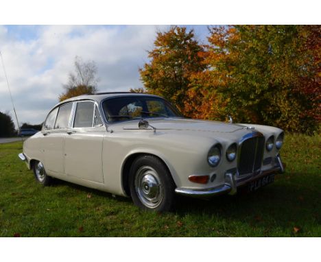 A 1967 Jaguar 420, registration number PLB 847E, chassis number P1F2910BW, cream. Introduced in October 1966 and seen as bein