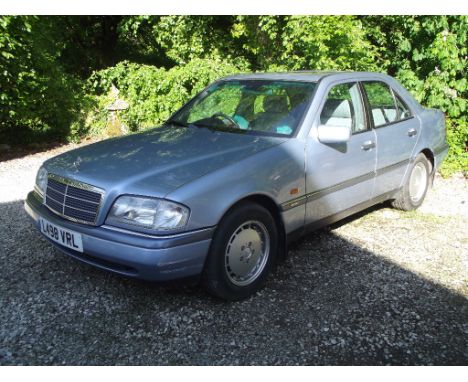 A 1994 Mercedes-Benz C220 Elegance, registration number L498 VRL, Pearl blue metallic. This low ownership C220 was supplied b