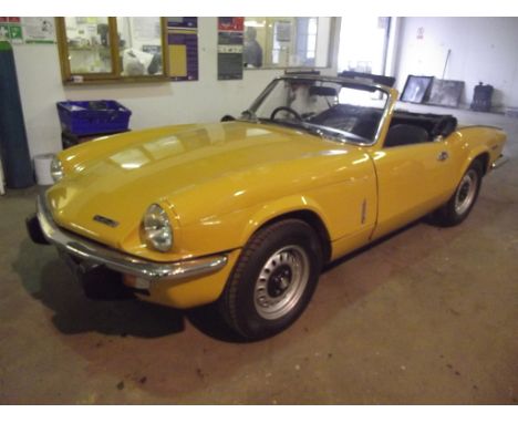 A 1971 Triumph Spitfire Mk IV, registration number BAC 778J, Saffron yellow. This garage proprietor owned Spitfire has been t