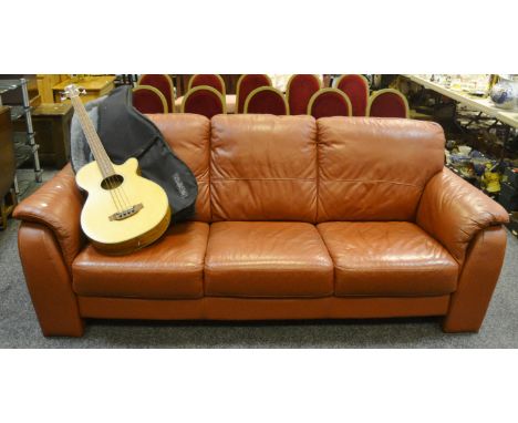 A contemporary tan leather  3 seater sofa, retailed by John Lewis