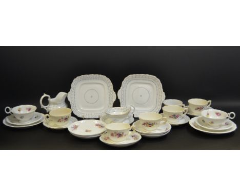 A Victorian Child's part tea service printed with pink floral sprigs; another printed with pink and green floral motifs inclu