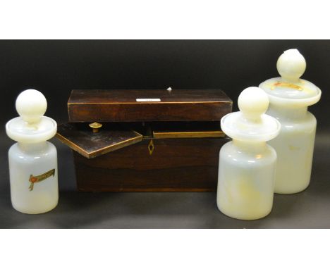 A Victorian mahogany tea caddy; Lion mask handles; a set of three opalescent Murano glass jars and covers