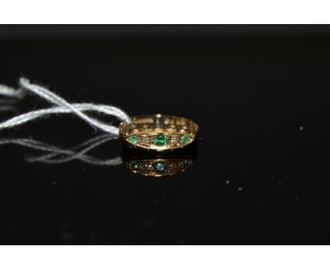 A Victorian green stone and diamond chip ring, 9ct gold shank