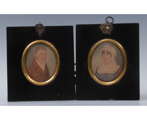 English School (19th century), a pair of portrait miniatures, of a gentleman and lady, half-length, he sports mutton chops, w