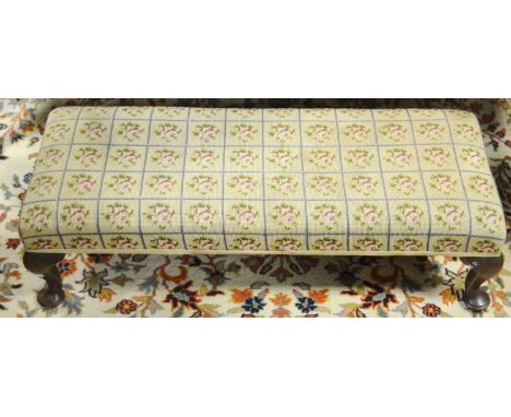An early 20th century footstool , Queen Anne style feet, tapestry top