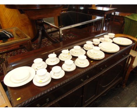 A gilt and white dinner/ tea service, Royal Albert