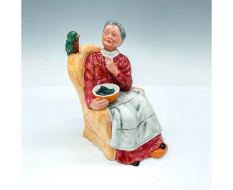 Elderly woman in yellow armchair, holding a bowl of pea pods. Golden Years series. Royal Doulton backstamp. Artist: William K