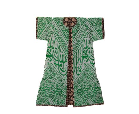 An Ottoman Talismanic Shirt with Bold Green Calligraphy on Cotton. An Ottoman talismanic shirt featuring an all-over pattern 