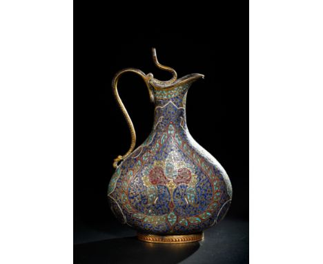 An Indian Kashmiri Gilt Copper Enamelled Ewer, 19th Century.The bulbous body is adorned with vibrant floral arabesques in ton