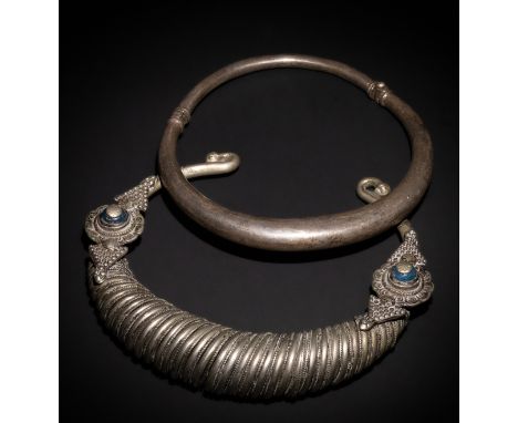 **NO RESERVE**A Lot of 2 White Metal Choker Necklaces, One with Coiled Design and the Other Plain Circular.This pair consists