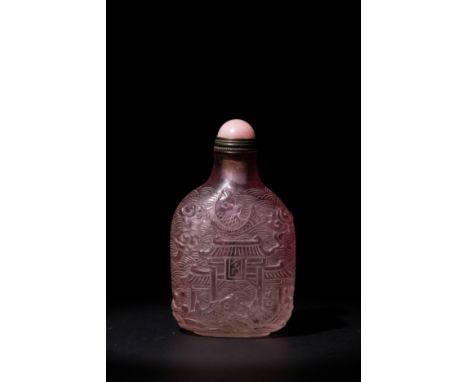 A Chinese Pink Glass Snuff Bottle with Fish and Palace Motif.A translucent pink glass snuff bottle, delicately carved on one 