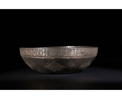 An Islamic Silver Bowl with Fish and Floral Motifs, Iran or Afghanistan, 4th Century A.D.The bowl features a gently rounded f