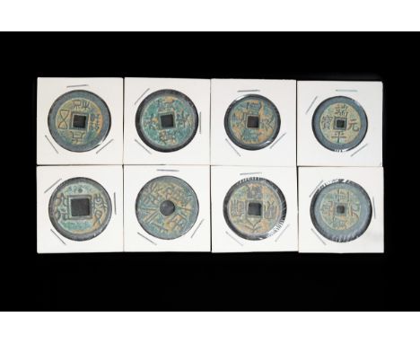 **NO RESERVE**A Collection of Chinese Bronze Coins with Square Central Holes.A collection of eight ancient Chinese cast bronz