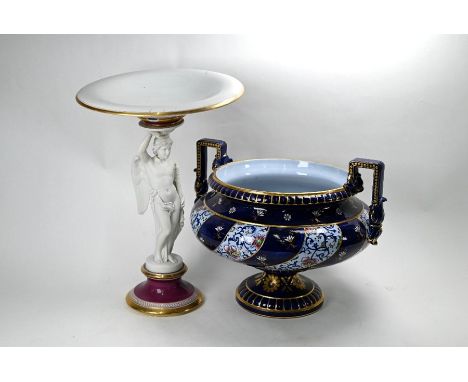 A late 19th Century French Sarreguemines majolica large two-handled vase on stemmed foot, with foliate spiral-banded decorati