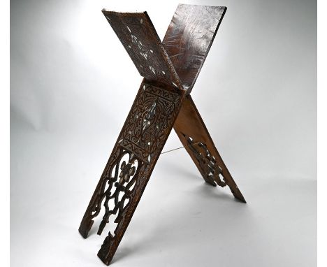 A carved wood Koran stand with mother of pearl inlay and chevron parquetry edging, 80 x 21.5 cm&nbsp;