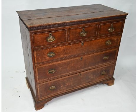 An 18th century oak chest of three short over three long graduated drawers on shaped bracket feet, 115 x 56 x 103 cm high