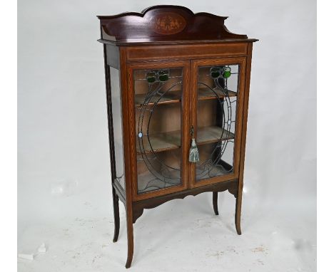 An Edwardian/Art Nouveau inlaid walnut display cabinet with lead glazed doors, on slender splayed legs, 92 cm wide x 38 cm de