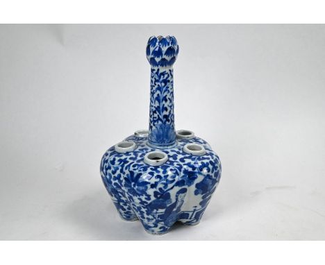 A Chinese blue and white porcelain tulip vase, late Qing or Republic period, the tall tapering neck rising from a lobed body,