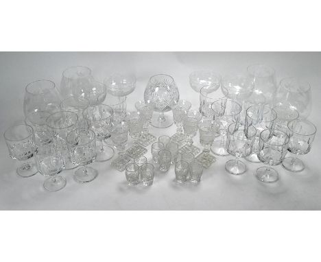 A set of eight each red and white wine-glasses with fluted cutting, to/w four brandy balloons etched with hunting scenes, fou