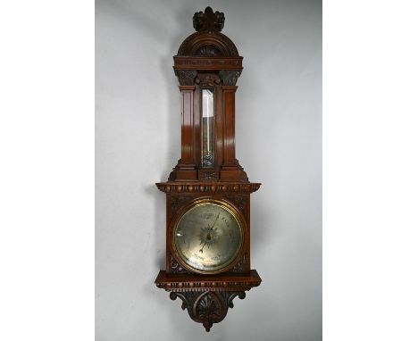 A late 19th century mahogany cased barometer with silvered dial, 100 cm high overall