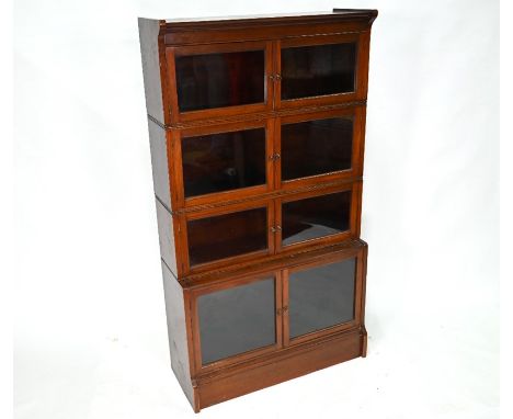 A four tier Lebus brand sectional mahogany bookcase in the Globe Wernicke style, each section with a pair of hinged glazed do