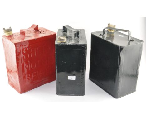 Three vintage oil cans, one being by Shell