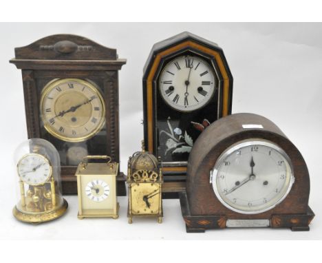 Various clocks, including three mantel clocks, an Anniversary clock and a Smith's lantern clock 