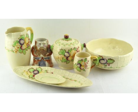 A collection of A J Wilkinson ceramics ' Leaf and Berry' wares, including pouring jug, lidded pot and more