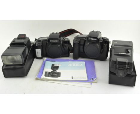 Two Canon camera bodies, EOS5 and EOS100, together with two flashes, Speedlite 430EZ and 540EZ, both with paperwork