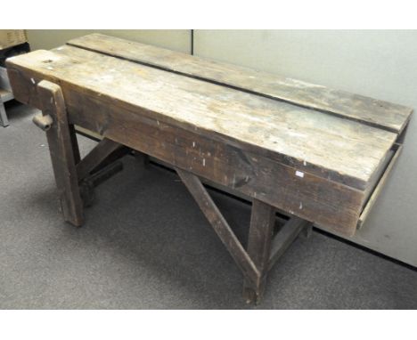 A vintage oak workshop bench, 80cm high x 180 cm long x 61 cm deep