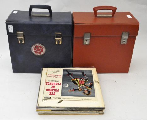 Two vintage record cases containing some records, including pop