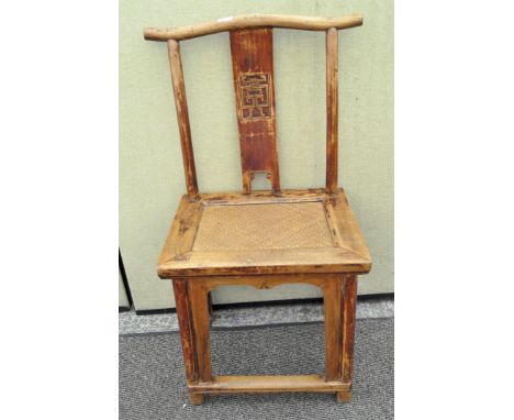 A Chinese wooden chair with wicker seat, wishbone shaped back, 100cm high