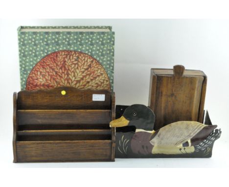 A wooden rectangular spice-box with fitted compartments, 19th century, an oak tiered letter rack and other items, the spice-b