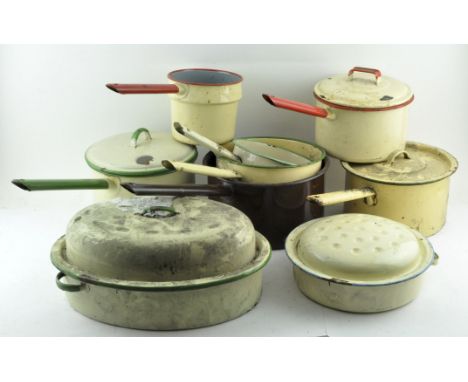 A collection of assorted enamel kitchenware, to include saucepans . 