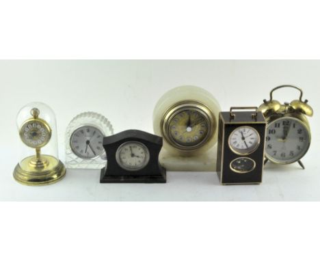 A group of assorted clocks, including an onyx mantel clock, an ebonised early 20th century mantel clock and more, largest 16.
