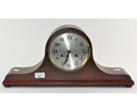 A mid-century mahogany cased mantel clock, the metal dial with Arabic numerals denoting hours, 53cm wide