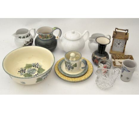 A collection of assorted ceramics, including examples by Poole pottery, together with a Quartz carriage clock by Metamec