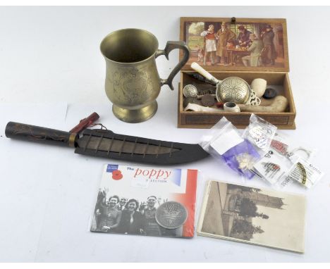 An assortment of collectables, including a GWR button, novelty lighter pen, tea strainer and others